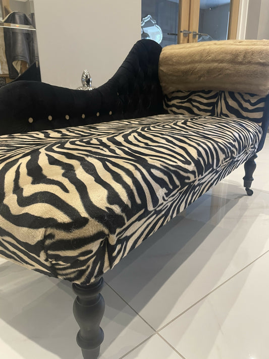 Baby chaise lounge in velvet zebra print and faux mink fur roll top