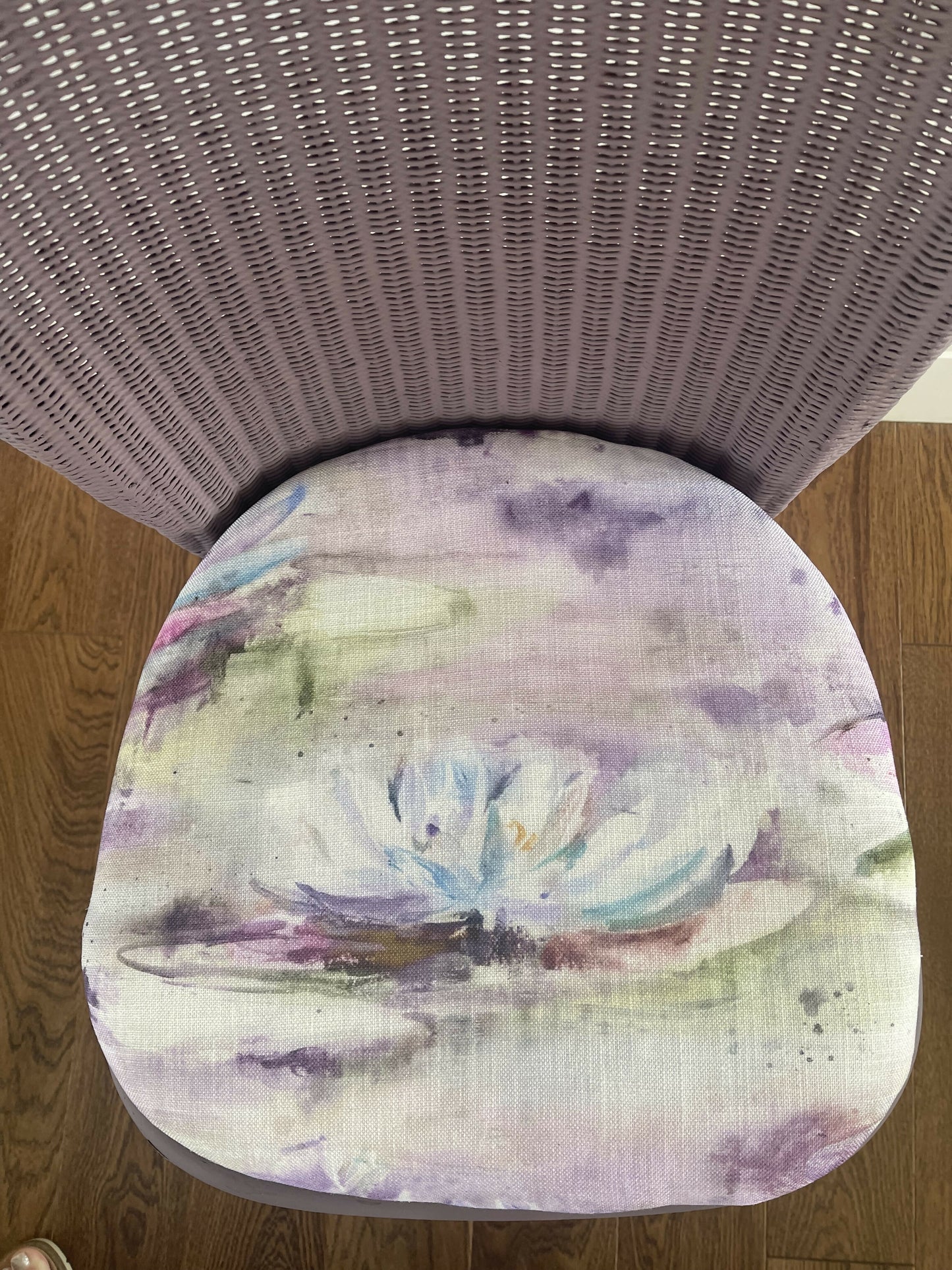 Stylish Lloyd loom accent chair very Matt aubergine paint and matching cotton lily themed fabric