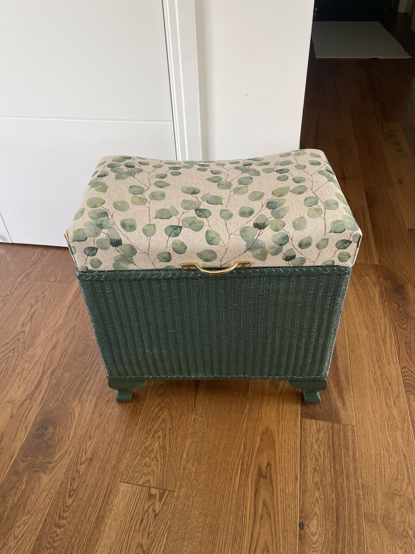 Mid century Lloyd loom style ottoman/padded storage stool. Green paint. Matching cotton top