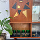 MCM Cocktail drinks cabinet in black and gold geometric retro pattern