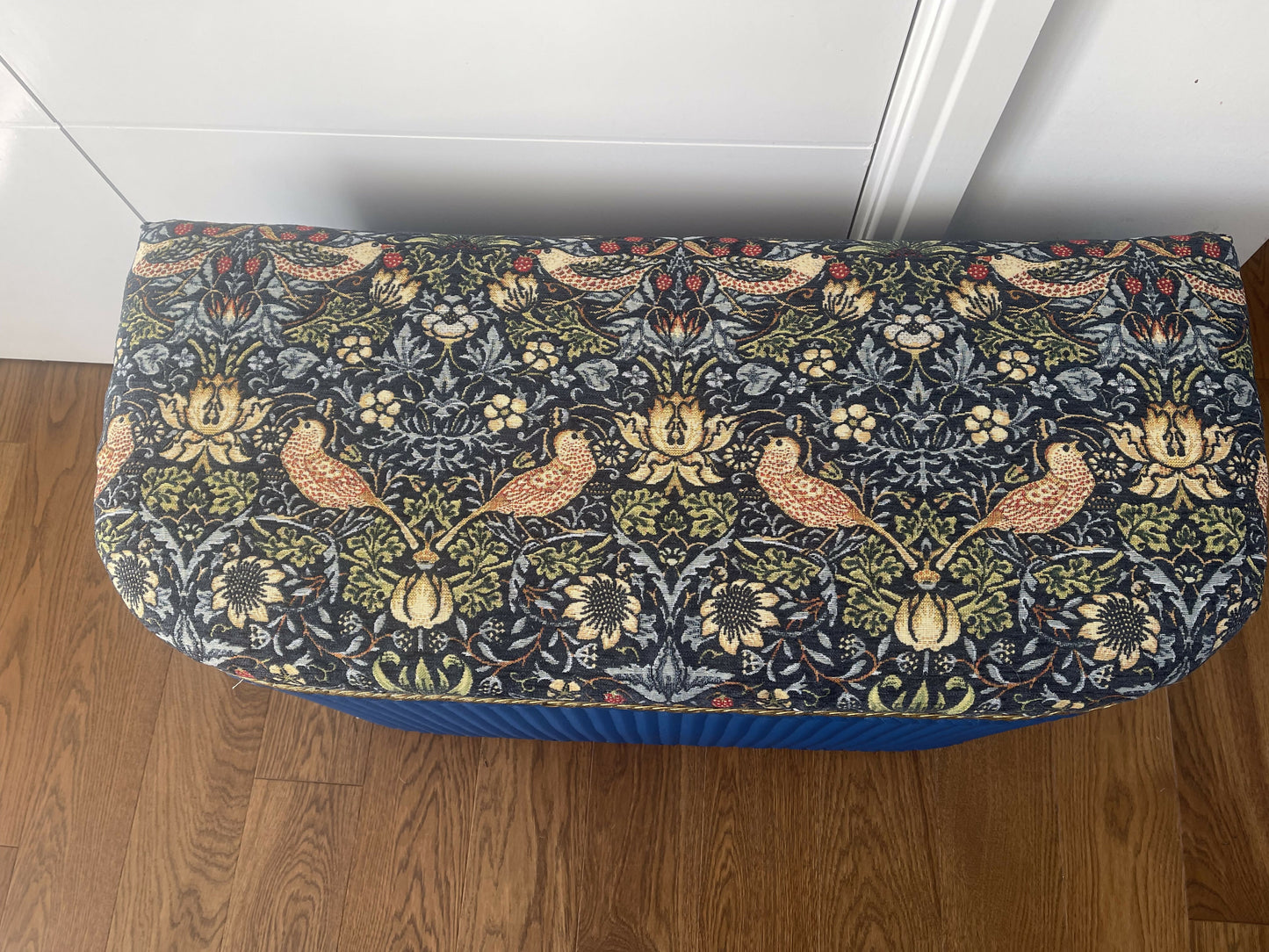 Mid century bright blue repainted ottoman with new William Morris style fabric