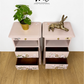 Dusky blush pink Stag Minstrel slim tea tray bedside tables with blossom and butterfly design. Nightstands pale pink