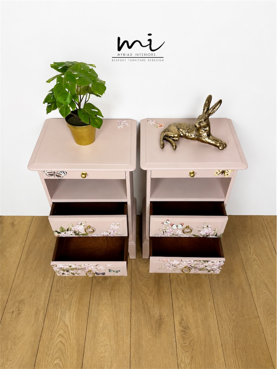 Dusky blush pink Stag Minstrel slim tea tray bedside tables with blossom and butterfly design. Nightstands pale pink