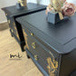 Matt Black Stag Minstrel bedside tables with gold floral and bird design. vintage nightstands. Teatray
