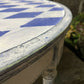 Vintage coffee table painted in a textured patina with french diamond stencil design.