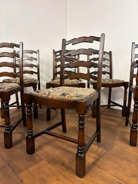 Vintage Set of Seven Oak Ladder Back Dining Chairs Including Carver Chair