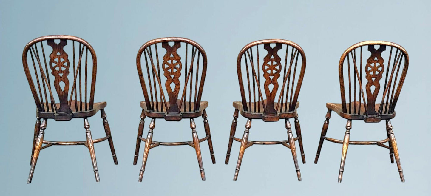 Set of Four Elm Wheel Back Windsor Chairs