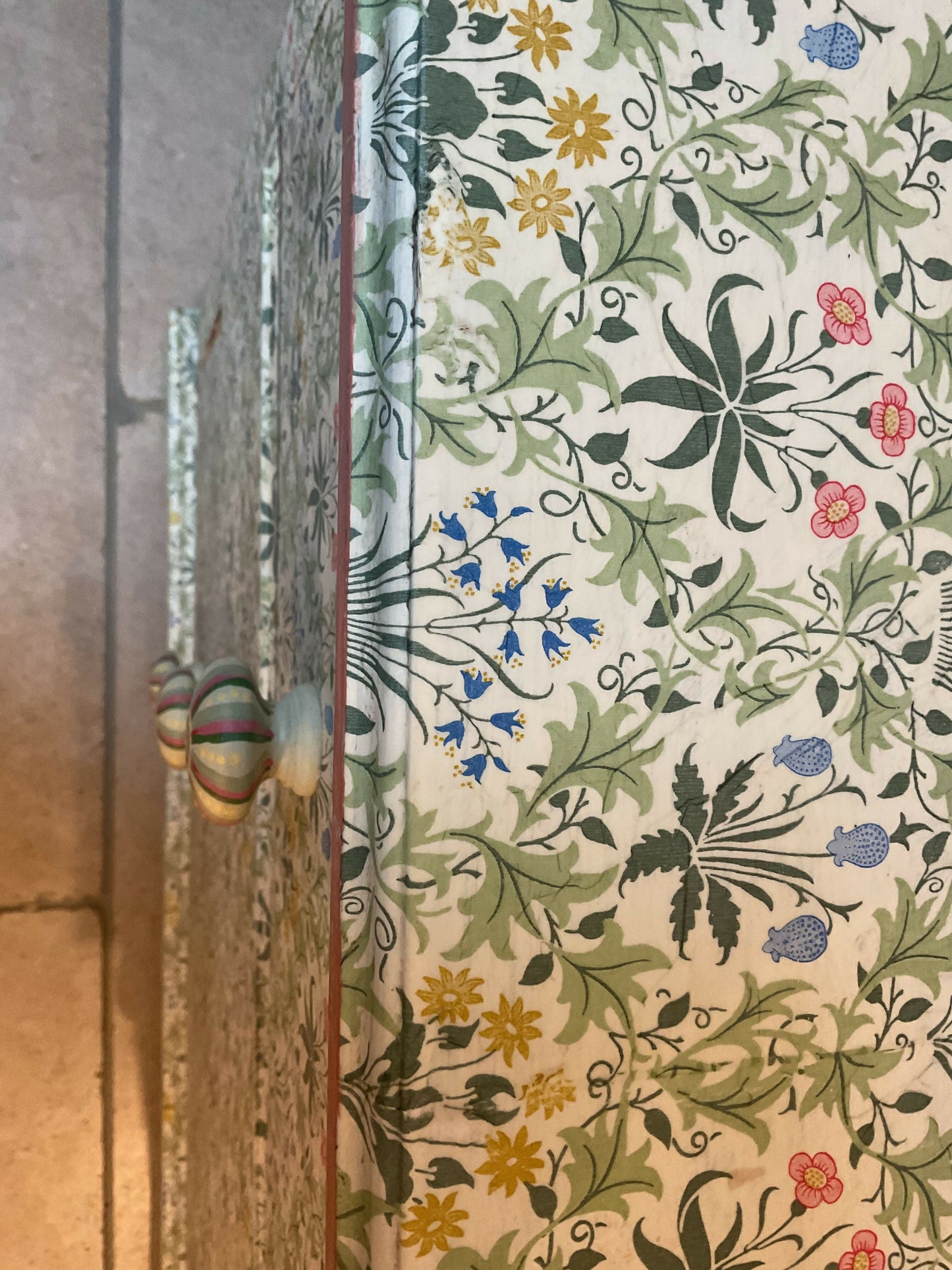 Antique chest of drawers covered in William Morris decoupage. With hand painted handles.