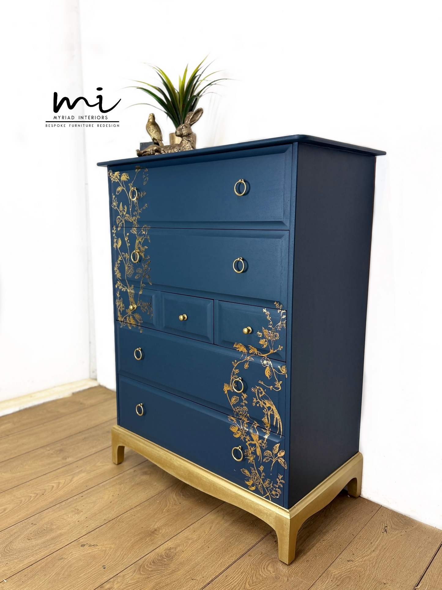 Refinished Stag Minstrel Tallboy Chest Of Drawers In Navy Blue With Gold Foil Floral Bird Design