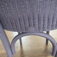 Stylish Lloyd loom accent chair very Matt aubergine paint and matching cotton lily themed fabric