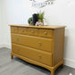 Stag minstrel chest of drawers in mustard