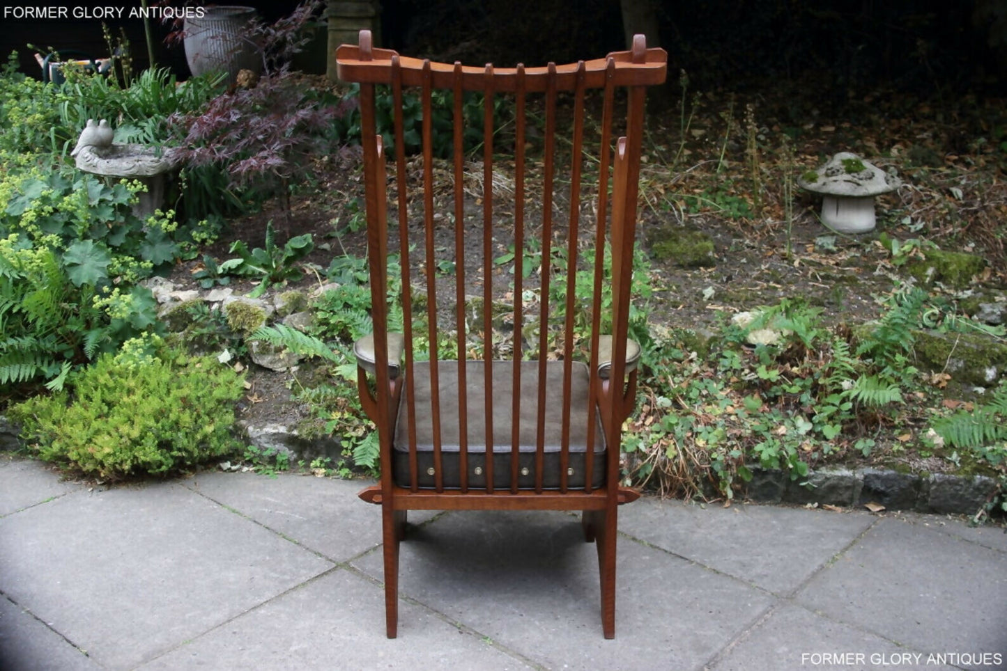 A RUPERT / NIGEL GRIFFITHS CARVED OAK DERBYSHIRE WING BACK LEATHER / ARMCHAIR
