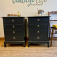 Stag four drawer black bedside cabinets, pair,