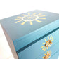 Upcycled hand painted drawers in teal with gold leaf design