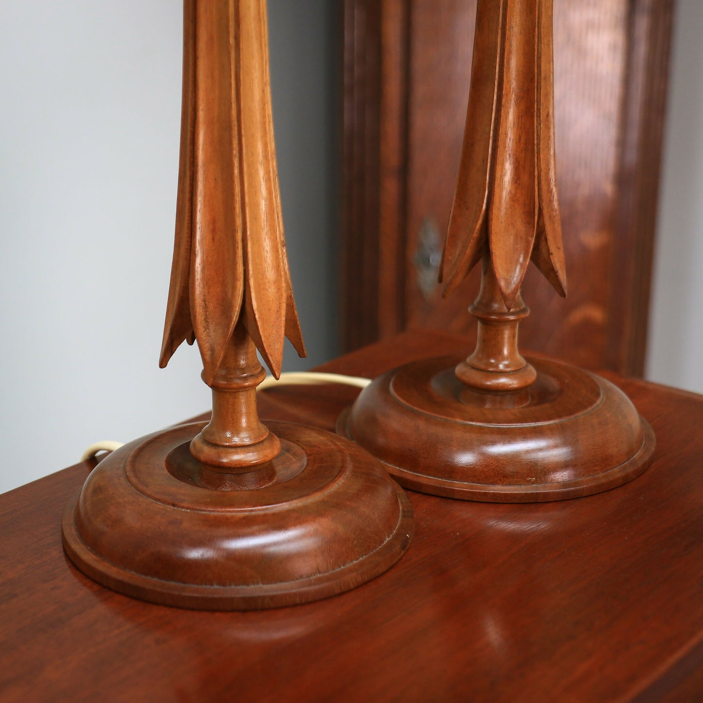 A Pair of Wooden Carved Walnut Table lamps