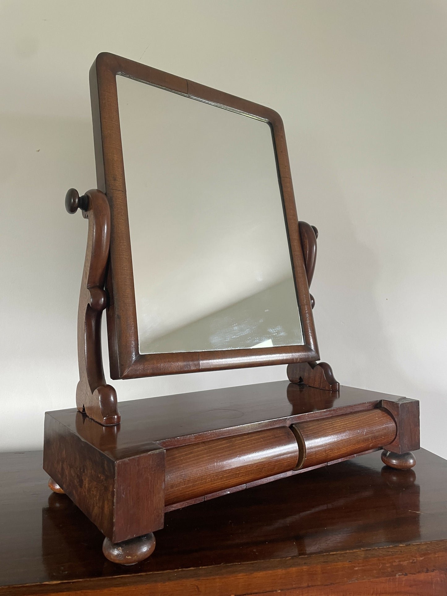 An Antique Victorian mahogany table top mirror