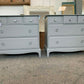 Pair Of Grey Painted Stag Minstrel Drawers