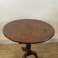 An Antique Oak Tripod Table