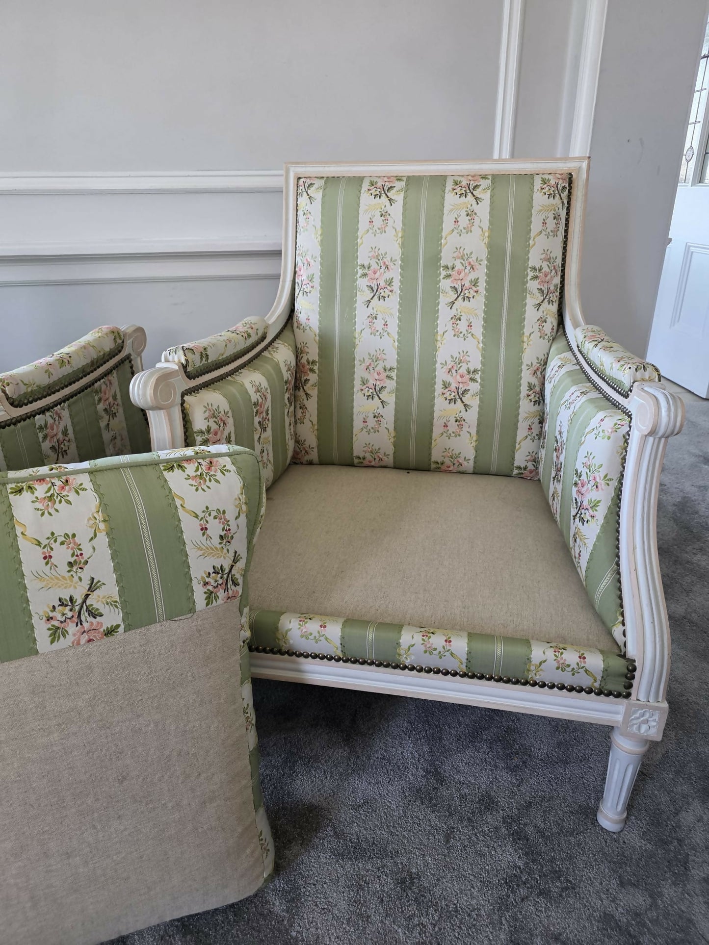 A Pair of French, Louis XVI Bergere Armchairs. Upholstered in French Embroidered Silk Upholstery Fabric