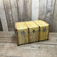 antique beige leather banded travel trunk with keys