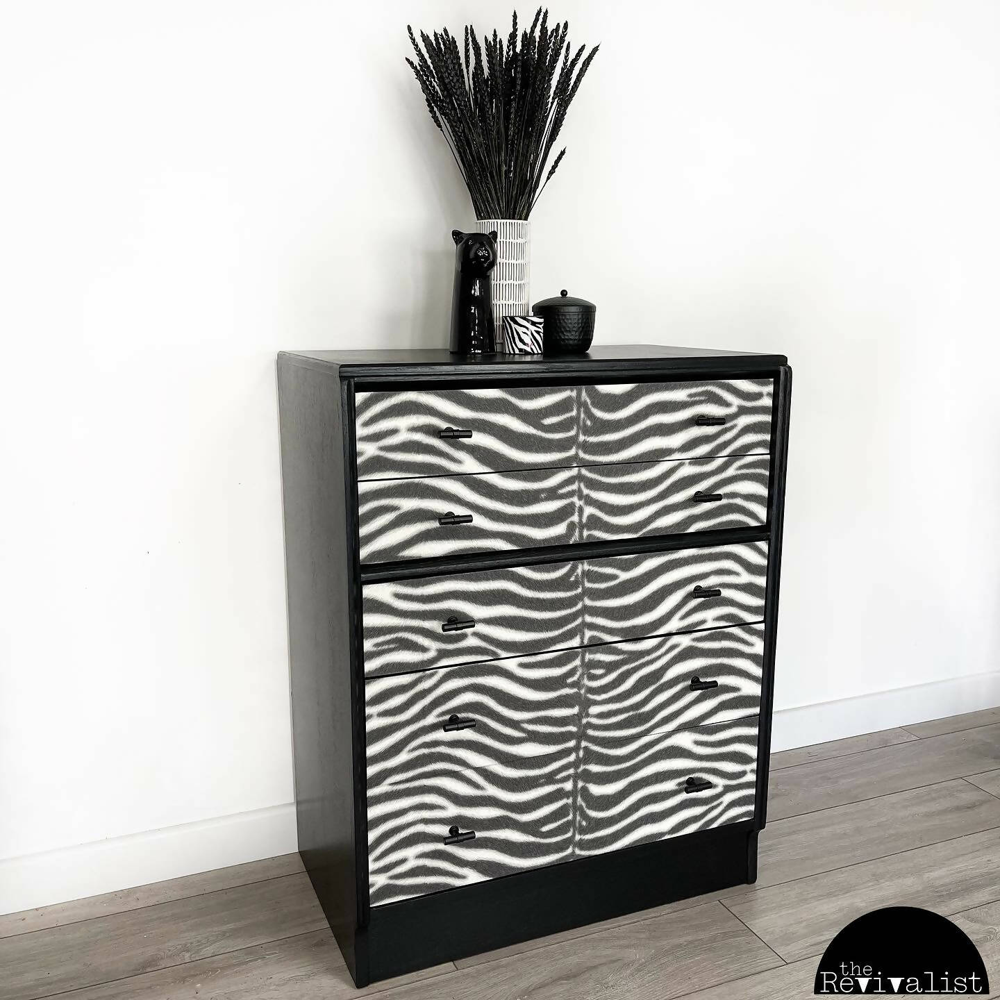 G PLAN CHEST OF DRAWERS WITH TEXTURED ZEBRA PRINT WALLPAPER