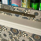 Unique drinks cabinet painted in green and cream