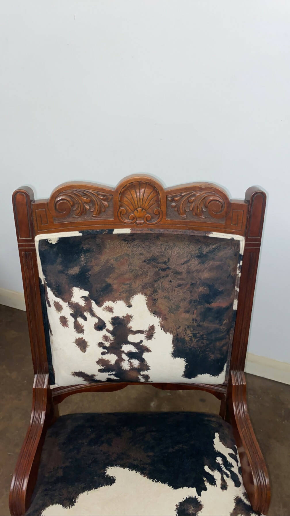 Reupholstered cowhide Victorian chair