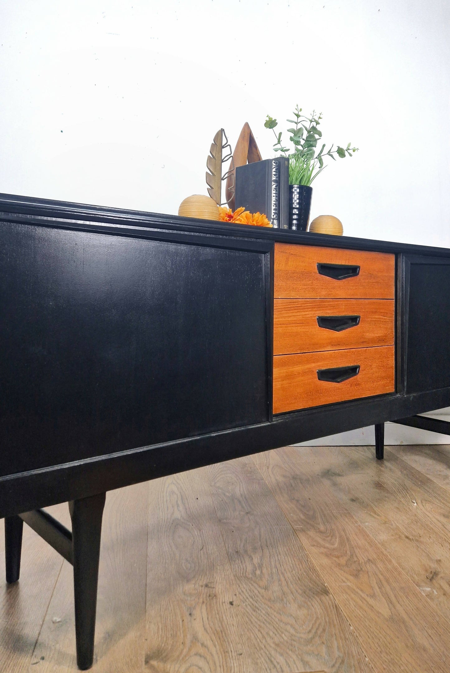 Black and teak midcentury modern sideboard