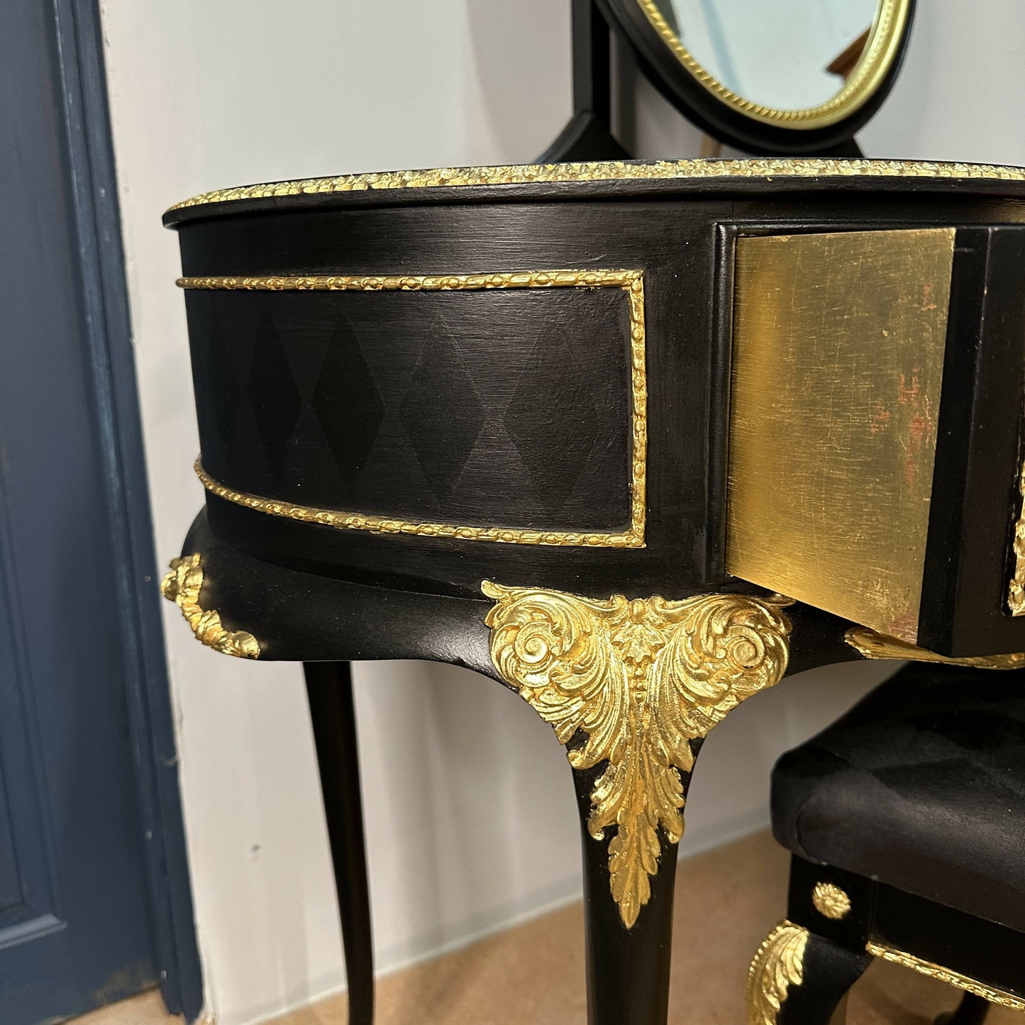 **This Item is Sold** Olympus dressing table and vintage stool. French Louis style in luxurious black with gold leaf and harlequin detail.