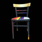 Hand painted school chair with vibrant rainbow stripe seat and gold leaf backrest. Abstract art design.