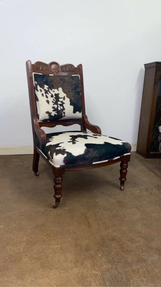 Reupholstered cowhide Victorian chair