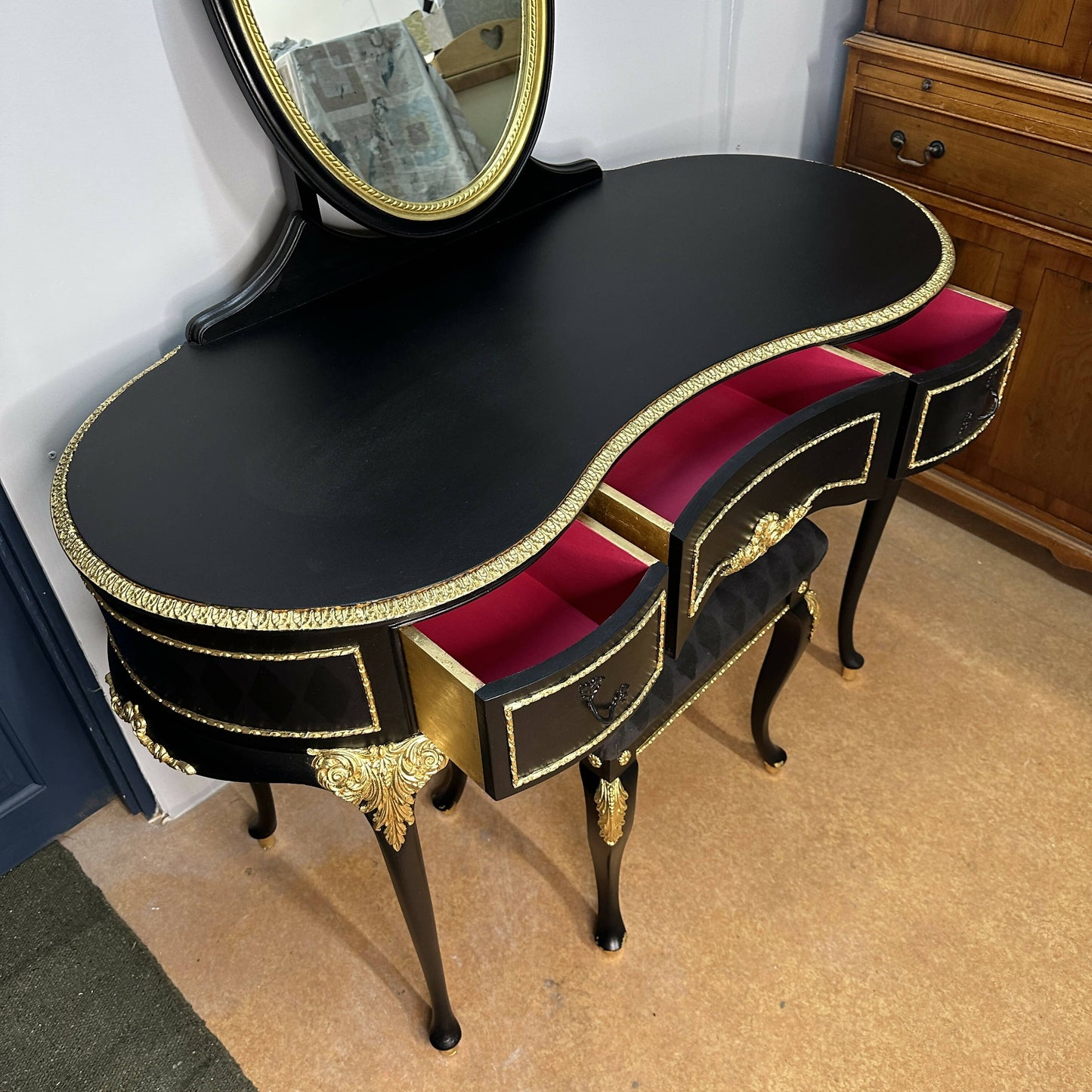 **This Item is Sold** Olympus dressing table and vintage stool. French Louis style in luxurious black with gold leaf and harlequin detail.