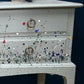 Vintage Stag sideboard hand painted in pale duck egg with abstract wild flower meadow scene to front.