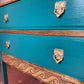 Upcycled vintage chest of drawers in turquoise with Lemur print lining