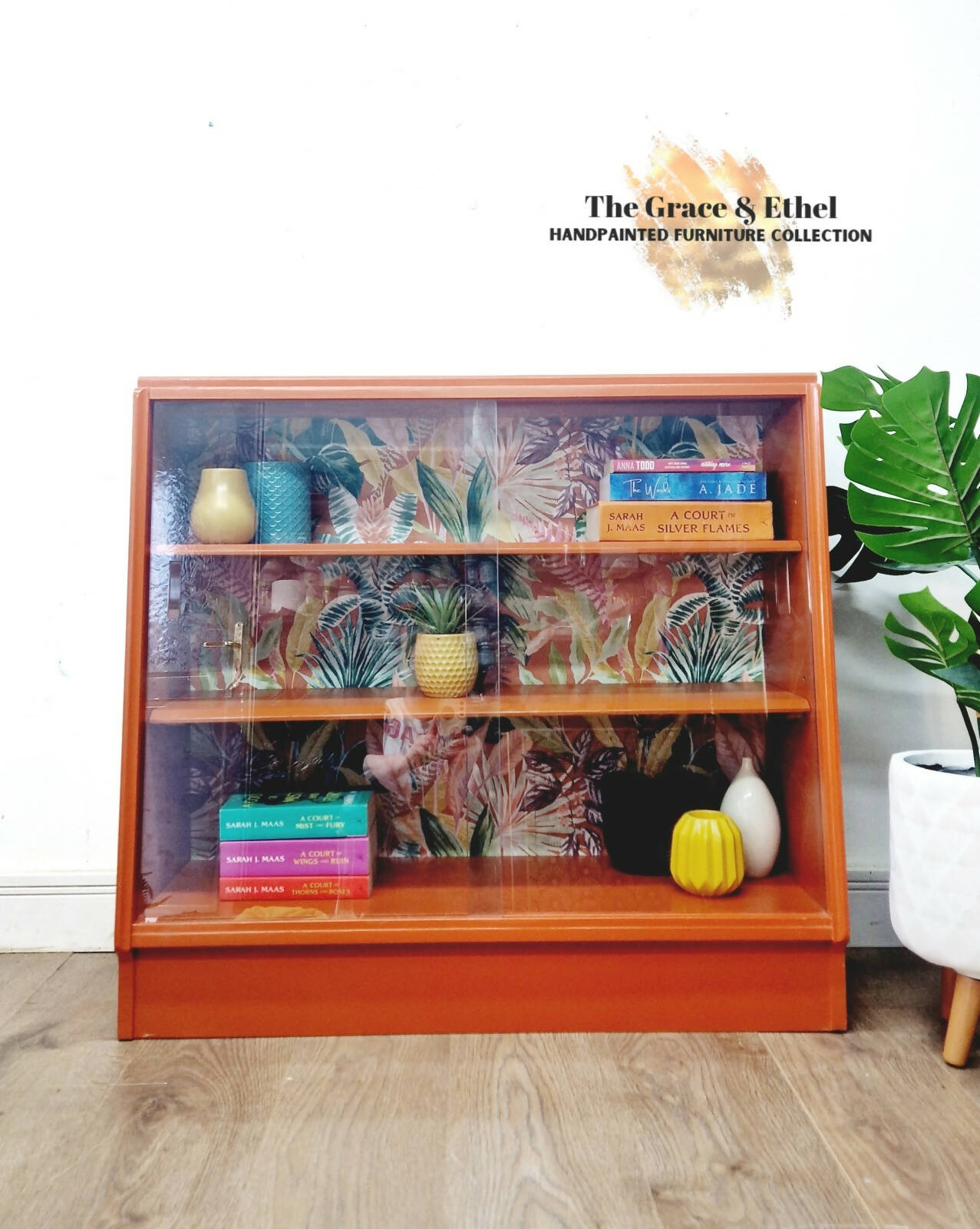 G plan orange vintage book shelf- glass display cabinet