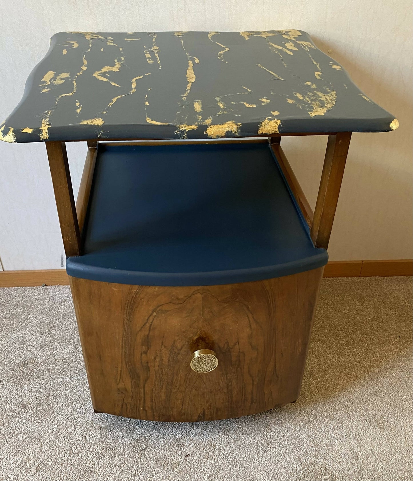 Vintage art deco cabinet with gold leaf