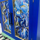 The Iris Blue Cabinet, Cobalt Blue, Soft Green with Gold accents.