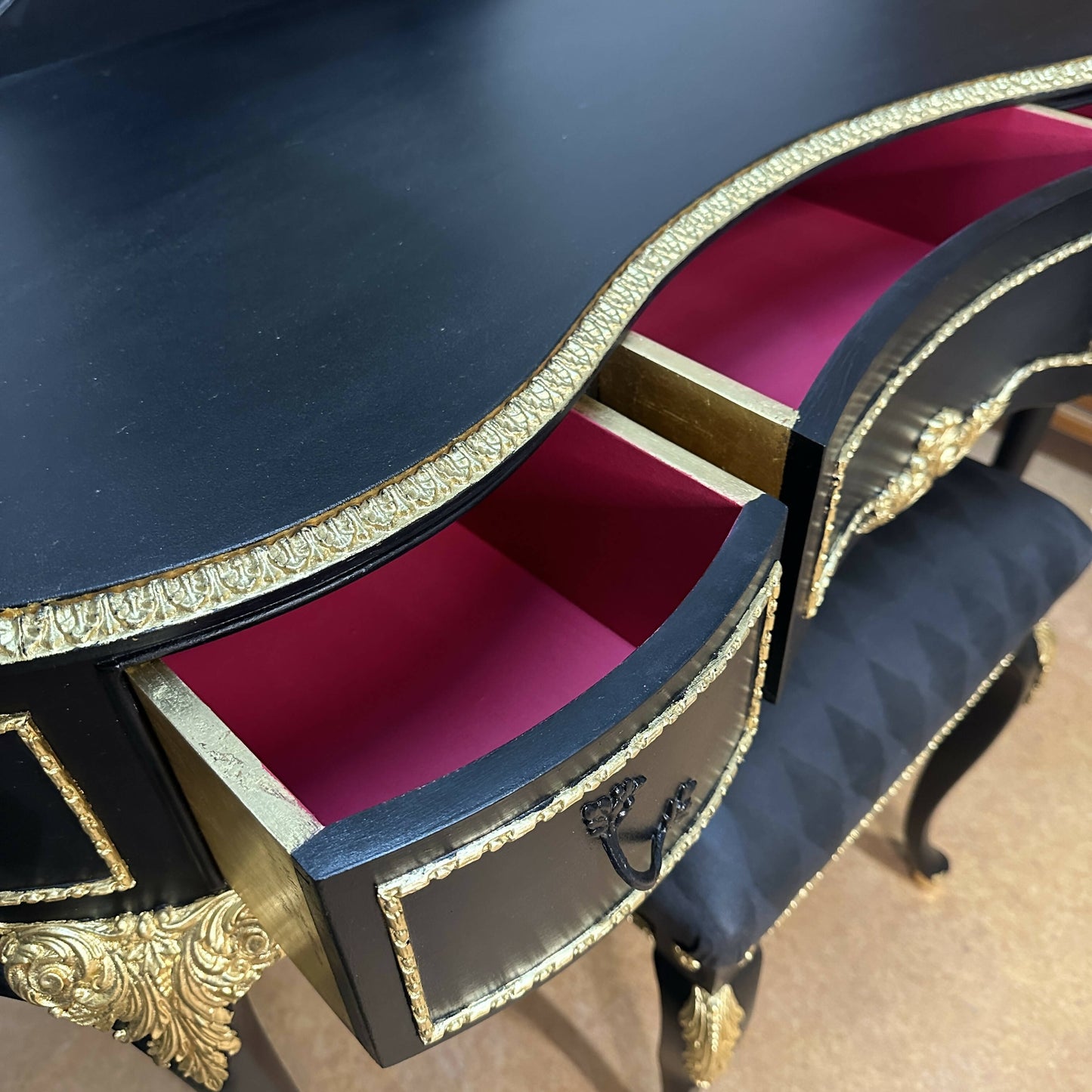 **This Item is Sold** Olympus dressing table and vintage stool. French Louis style in luxurious black with gold leaf and harlequin detail.