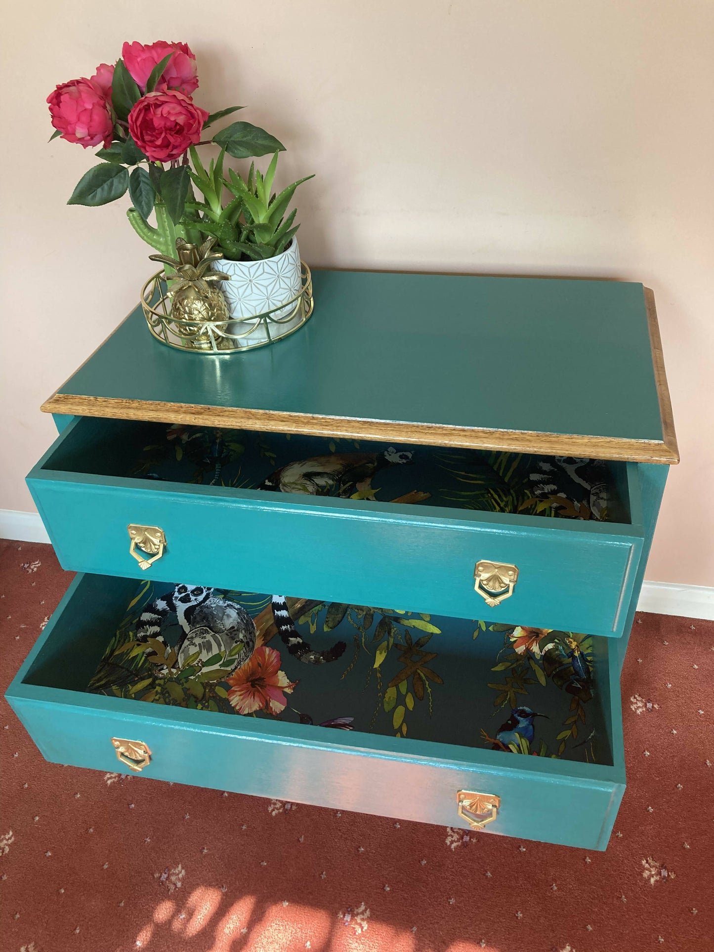 Upcycled vintage chest of drawers in turquoise with Lemur print lining