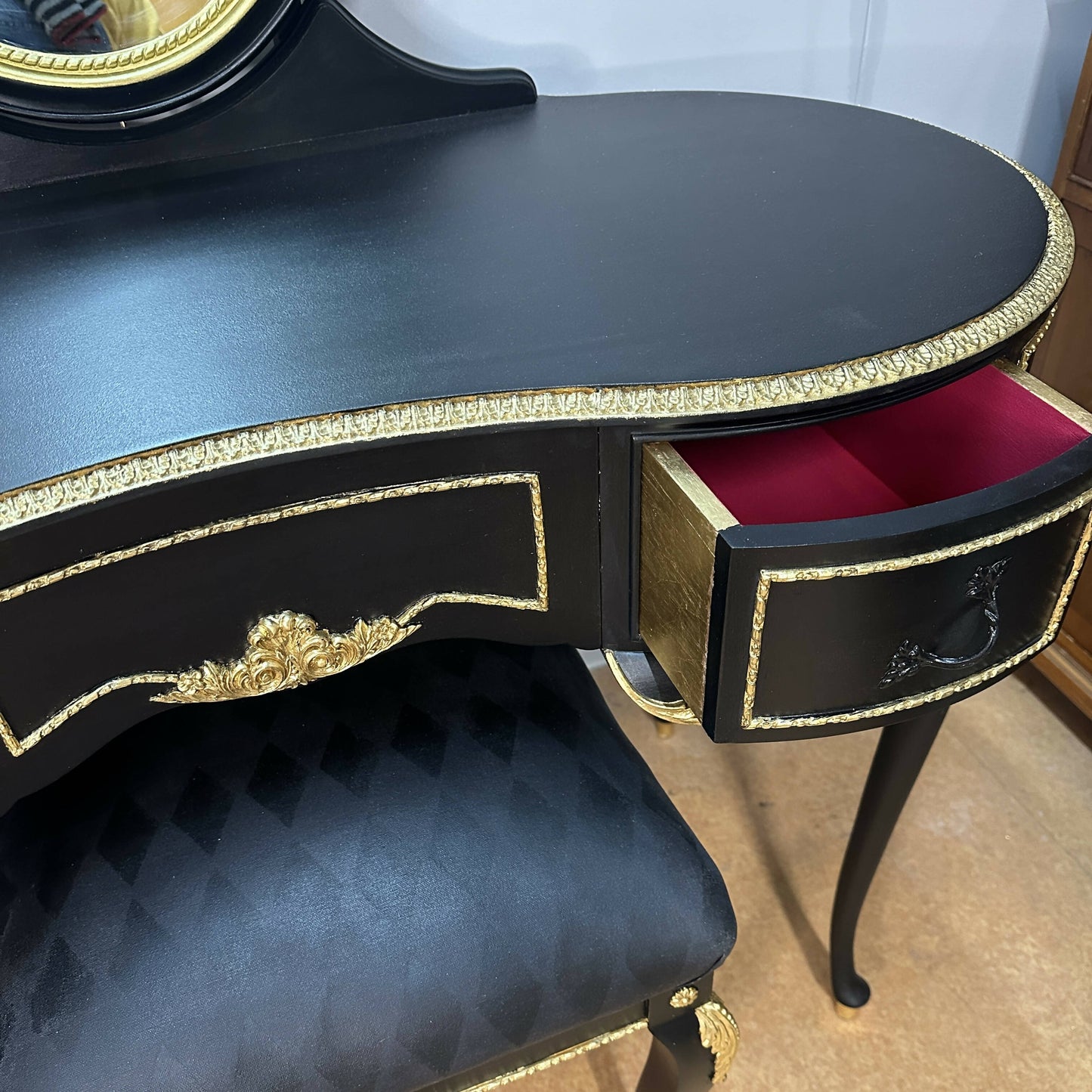 **This Item is Sold** Olympus dressing table and vintage stool. French Louis style in luxurious black with gold leaf and harlequin detail.