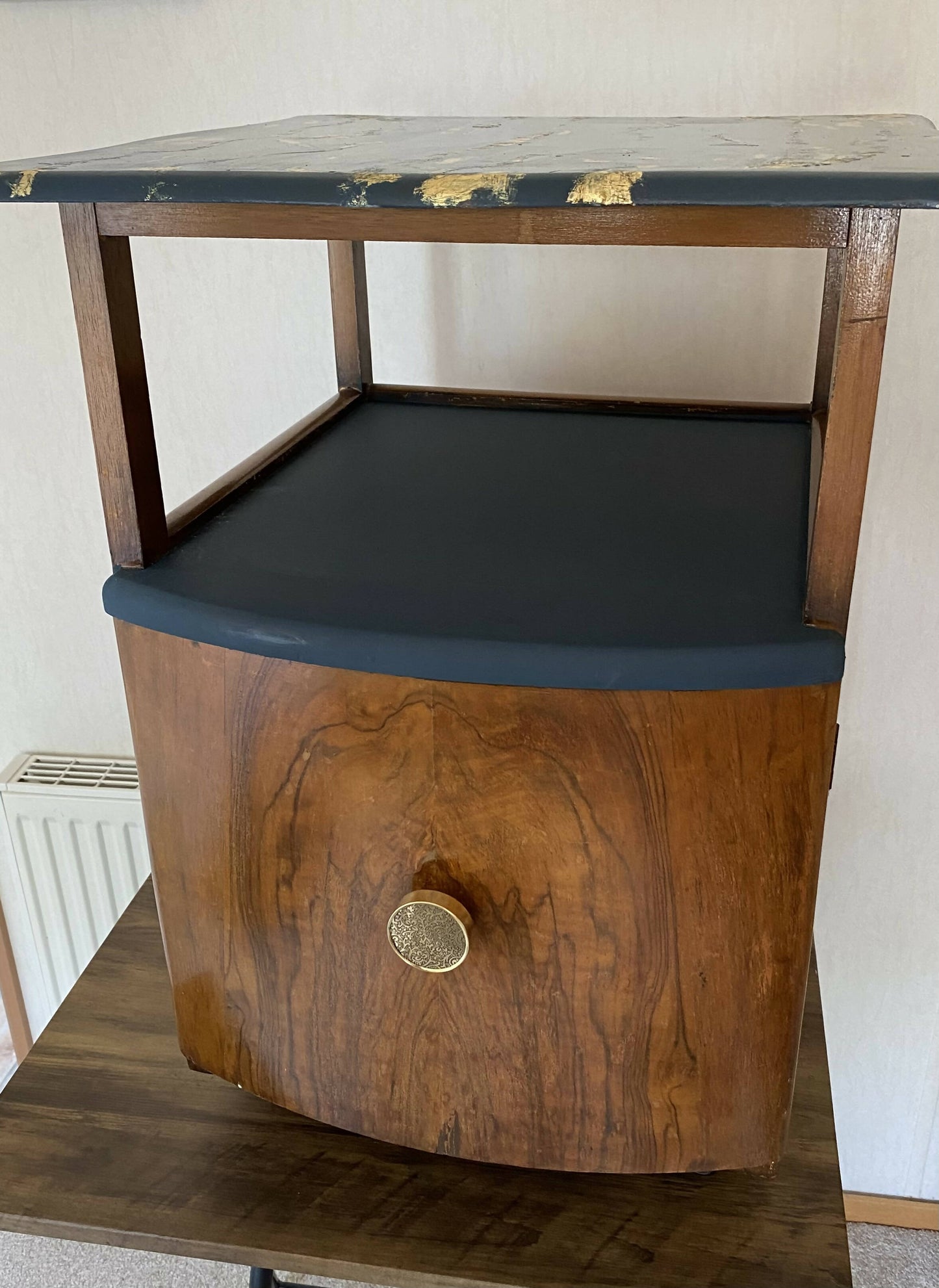 Vintage art deco cabinet with gold leaf