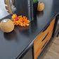 Black and teak midcentury modern sideboard